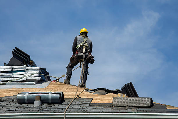 Professional Roofing technician working in Amery, WI